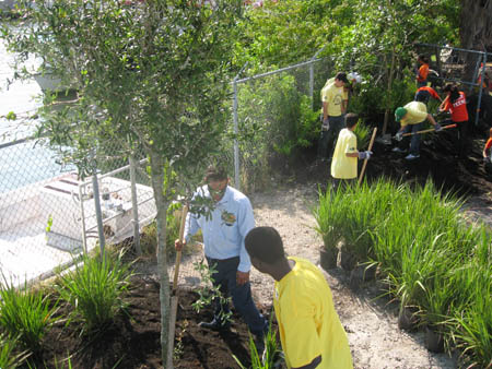 4 26 08 Bellsouth volunteers planting trees on riverfront